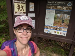 woman near hiking trail